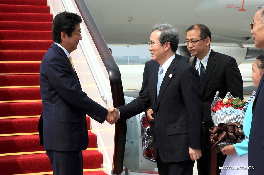 Japanese Prime Minister Shinzo Abe arrives in China's eastern city of Hangzhou to attend the 11th Group of 20 (G20) summit, Sept. 4, 2016. (Xinhua/Li Mingfang) Japanese Prime Minister Shinzo Abe arrives in China's eastern city of Hangzhou to attend the 11th Group of 20 (G20) summit, Sept. 4, 2016. (Xinhua/Li Mingfang)