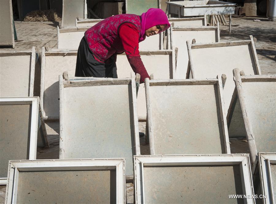 The handmade mulberry-bark paper, originating thousands of years ago in Xinjiang, has been listed as intangible cultural heritage by the UNESCO. The handmade mulberry-bark paper, originating thousands of years ago in Xinjiang, has been listed as intangible cultural heritage by the UNESCO.