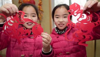 Activities held around China to greet Spring Festival