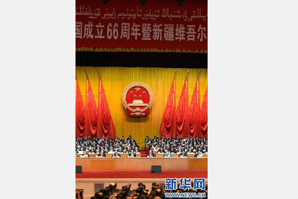 10月1日，慶祝中華人民共和國(guó)成立66周年暨新疆維吾爾自治區(qū)成立60周年大會(huì)在新疆人民會(huì)堂隆重舉行。 新華社記者 高潔 攝 