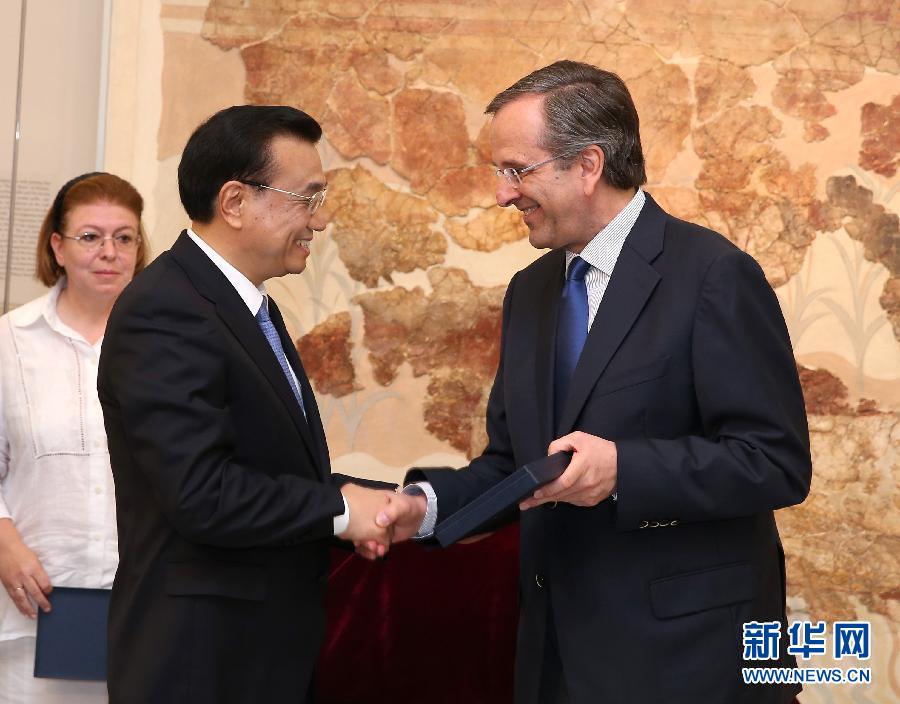 6月21日，國務(wù)院總理李克強與希臘總理薩馬拉斯共同出席希臘伊拉克利翁博物館新館開館儀式并發(fā)表講話。 新華社記者 龐興雷 攝