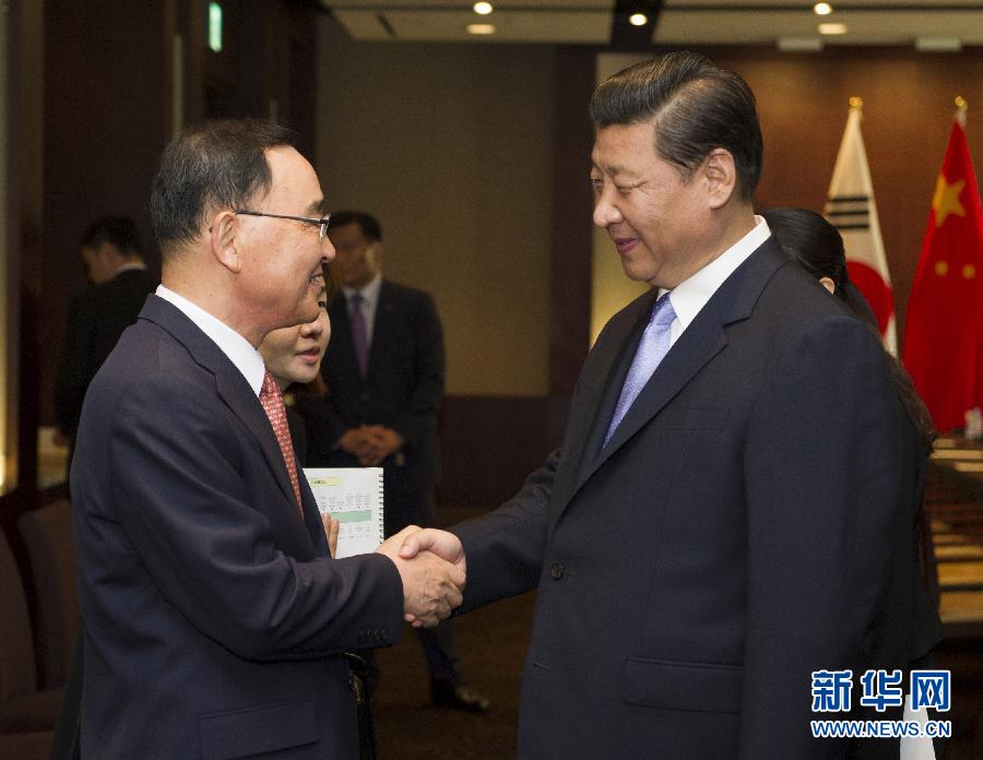 7月4日，國家主席習近平在首爾會見韓國總理鄭烘原。 新華社記者謝環(huán)馳攝  