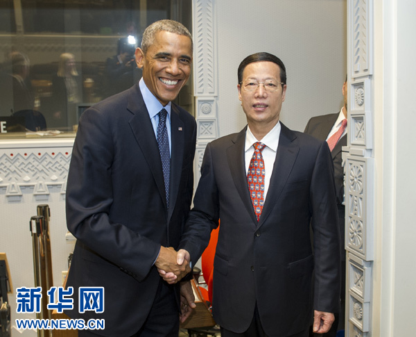 9月23日，國家主席習近平特使、國務院副總理張高麗在紐約會見出席聯(lián)合國氣候峰會的美國總統(tǒng)奧巴馬。 新華社記者王曄攝