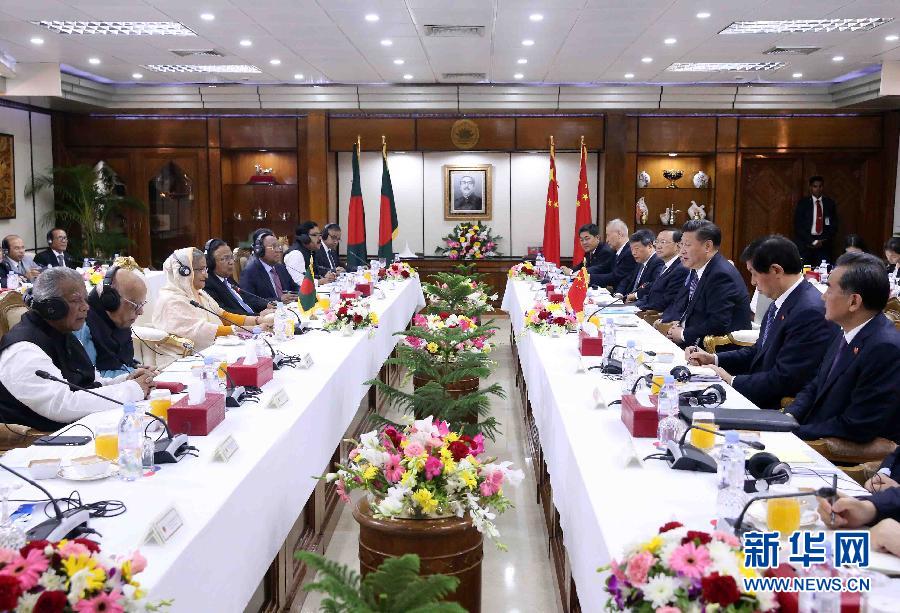 10月14日，國家主席習近平在達卡同孟加拉國總理哈西娜舉行會談。 新華社記者劉衛(wèi)兵攝 