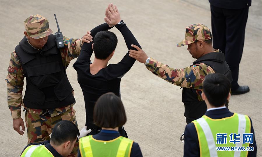 (國(guó)際)(2)老方向中方移交104名電信詐騙犯罪嫌疑人